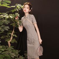 The new summer small temperament type of modified young girl dress qipao fashion retro grid in 2023