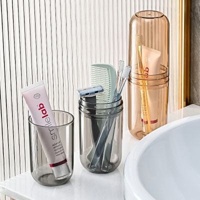 ที่ใส่แปรงสีฟันแบบพกพาสำหรับเดินทางในห้องน้ำที่จัดเก็บแปรงสีฟันโปร่งใสแฟชั่นใหม่พร้อมแก้วล้าง