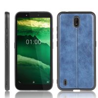 สำหรับ Nokia C1การเย็บผิวลายวัวกันกระแทก + เคส PU + TPU (สีน้ำเงิน)