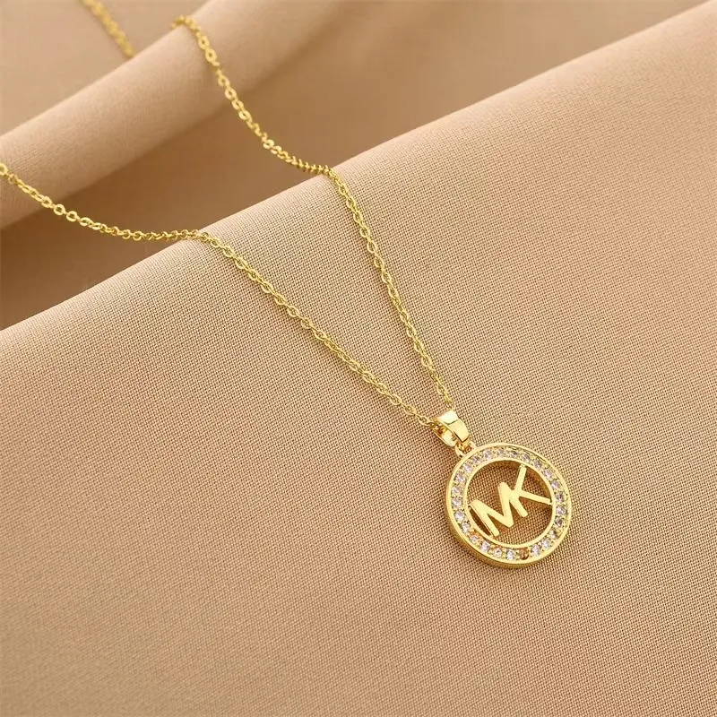 mk gold pendant