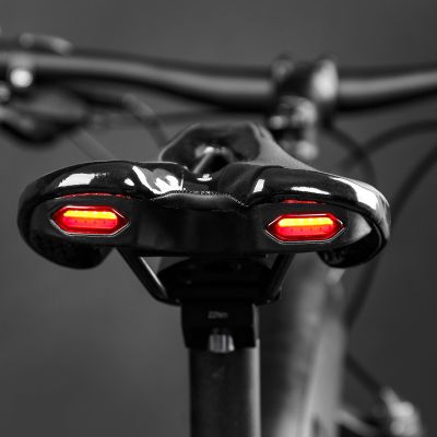 ที่นั่งจักรยาน MTB เบาะนั่งจักรยานบนถนนพร้อมเตือนไฟท้าย USB ชาร์จไฟได้หมอนรองแบบนุ่ม PU ระบายอากาศได้ดีขี่จักรยานเสือภูเขาแข่งรถ