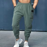 ยี่ห้อใหม่ Mens แฟชั่นการฝึกอบรม Joggers กางเกงลำลองกีฬาฟิตเนส Skinny กางเกงวอร์มยิมสีดำ Jogger กางเกงแทร็ค