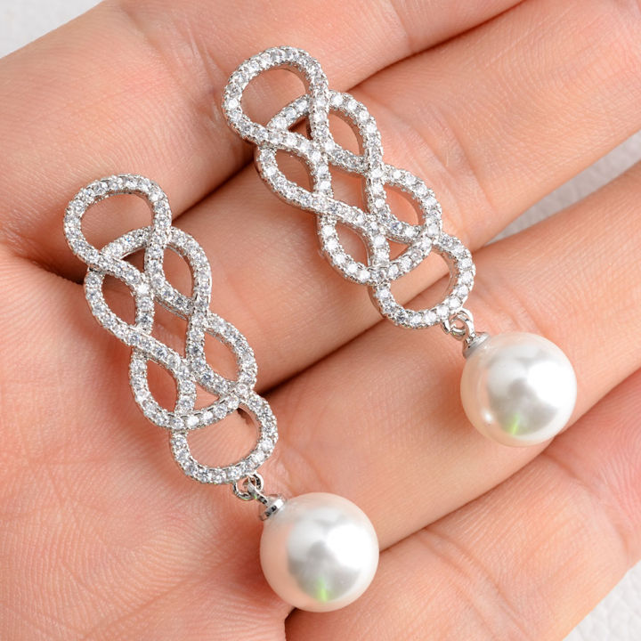 white-teardrop-sea-shell-pearl-white-golden-plated-cz-pave-earrings