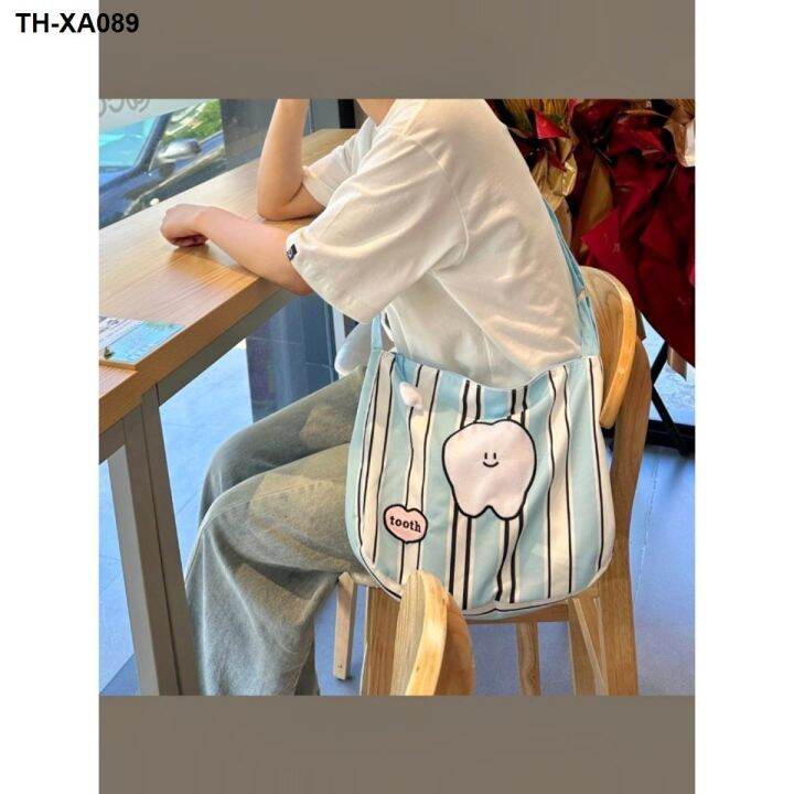 blue-stripe-tooth-bag-2023-ใหม่moriกระเป๋าmessengerกระเป๋าสะพายไหล่ความจุขนาดใหญ่สบายๆกระเป๋าโท้ทขนาดเล็กสด