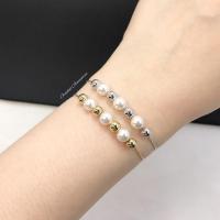 Triplets pearl swa bracelet (ข้อมือรูดงานชุบทองคำขาว มุก Swarovski)