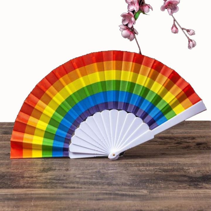 พัด-พัดสีรุ้ง-พัดมือถือ-พัดมือจับ-พัดหลายสี-พัดหลากสี-พับได้-ก้านพลาสติกสีขาว-rainbow-lgbt-lgbtq-pride-gay-hand-fan-parade-party-fancy-prop
