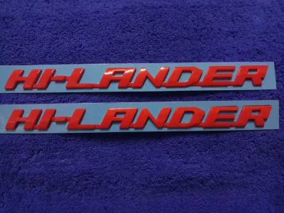 AD.โลโก้ HI-LANDER สีแดง 23.5×1.8cm (รุ่น ISUZU D-MAX 2020) ราคาแพ็คคู่ 2ชิ้น