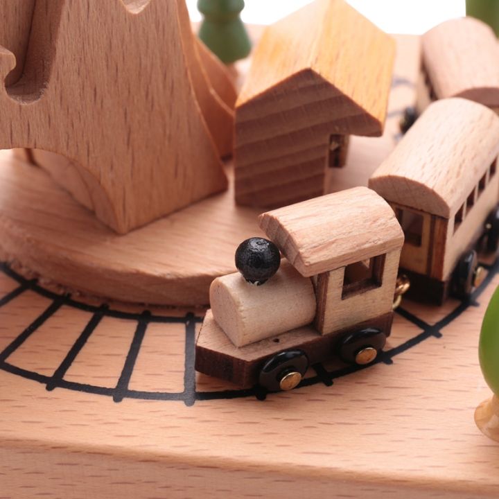 wooden-musical-box-featuring-mountain-tunnel-with-small-moving-magnetic-train-plays