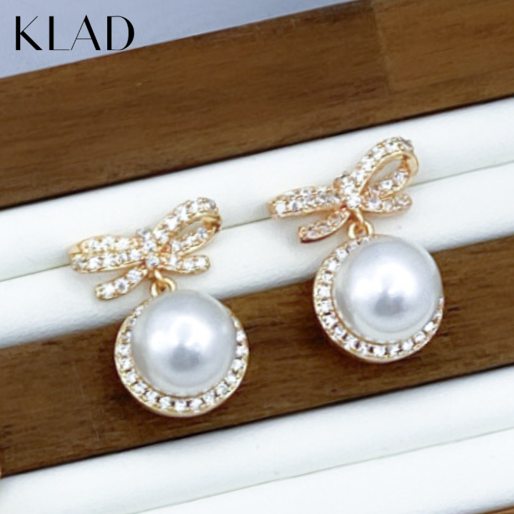 KLAD Zana Earrings (Dangling Pearl in Gold Collection) by
