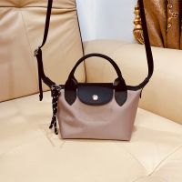 Longchamp French mini cowhide dumpling bag womens nylon fashion portable lazy wind cute messenger bag mini shoulder bag