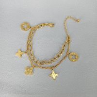 d363218 สร้อยข้อมือสแตนเลสจี้ใบโคลเวอร์สี่ใบไม้สแตนเลสสําหรับผู้หญิง 18K