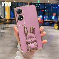 YBDเคสโทรศัพท์ใหม่สไตล์เข้ากันได้สำหรับ OPPO Reno 8T 4G Reno 8T 5G A1 Pro RENO 8 5G 8Pro RENO 9 9 Pro 5G เคสการ์ตูนน่ารัก3Dลายกระต่ายยิ้มกรอบนุ่มขาตั้งพับได้