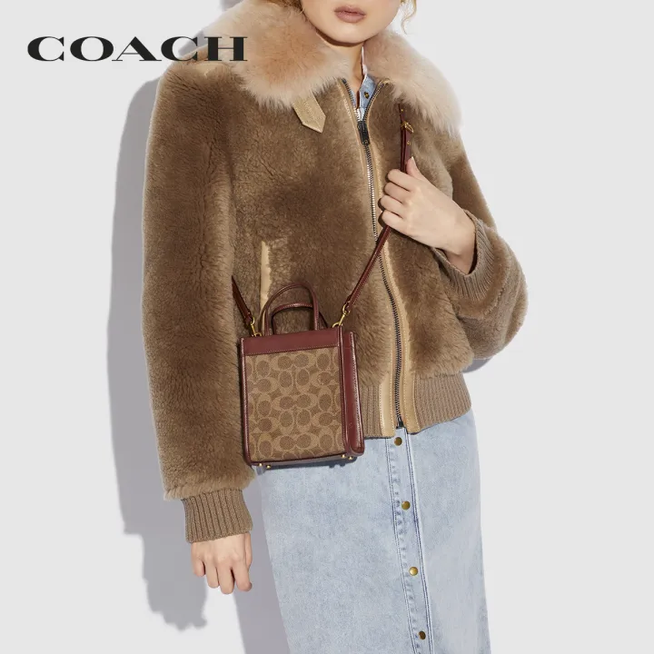 coach-กระเป๋าสะพายข้างผู้หญิงรุ่น-mini-cashin-tote-in-signature-canvas-สีครีม-c5277-b4nq4