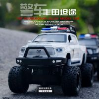 1:32 Toyota road off-road police car alloy car model with sound and light return shock absorption toys wholesale