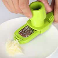 Hot! 1PCS Garlic Crusher Press Multi-Functional Manual Ginger Garlic Grinding Grater Cutter Garlic Peeler Kitchen Tools