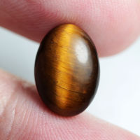 5.05 ct ไทเกอร์ อาย (Unheated Tigers Eye) ทรงไข่หลังเบี้ย