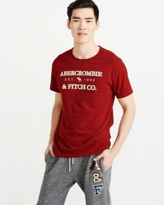 Abercrombie Fitch เสื้อยืดผ้าฝ้ายพิมพ์โลโก้ของผู้ชายแขนสั้นแบบหลวม