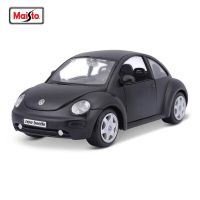 Maisto โมเดลการหล่อดายโมเดลแบบสถิตรถโลหะผสม1:25 Volkswagen NEW BEETLE ของขวัญของสะสมการเล่นน้ำ