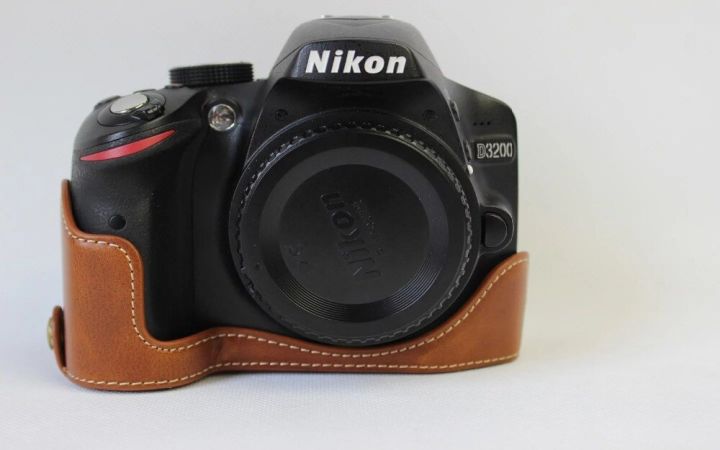 กระเป๋ากล้องวิดีโอหนังแท้แบบใหม่สำหรับ-nikon-d3200-d3100เคสครึ่งตัวหนังแท้ผ้าคลุมรถสีกาแฟสีน้ำตาลดำ