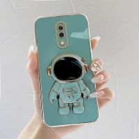 เคสโทรศัพท เคส realme x นักบินอวกาศขาตั้งแบบพับได้แฟชั่นสีทึบหรูหราชุบโครเมียมนุ่ม TPU เคสโทรศัพท์สแควร์คลุมทั้งหมดเคสป้องกันกล้อง