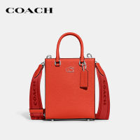 COACH กระเป๋าทรงสี่เหลี่ยมผู้ชายรุ่น Tote 16 With Signature Canvas Interior สีส้ม CJ795 B4D