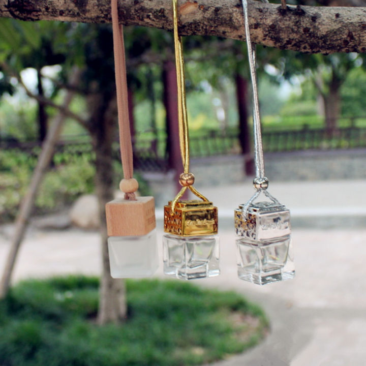 10pcslot-8ml-thick-glass-car-perfume-bottle-empty-hanging-pendant-bottles-mini-refillable-vials-with-wooden-cap