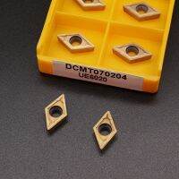 DCMT070204 UE6020 เม็ดมีดคาร์ไบด์ DCMT070204 ใบมีดเครื่องมือกลึงภายใน CNC อุปกรณ์เครื่องมือตัด