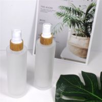 100ml Frosted Glass Spray Bottle Cosmetic Wood Grain Bamboo Cap Emulsion Pump Container Packaging Travel Size Bottles Containers