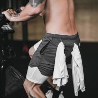 [MCPW] muscle popular logo quick-drying gym shorts male brother false two training pants pants in the summer