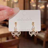 ? เครื่องประดับ S925 silver needle south Korean new bow earrings female ins tide luxury niche zircon pearl earrings earrings