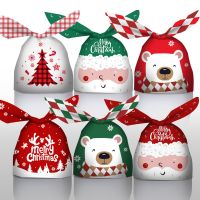 HOT TIQAIASGOP 105 50Pcs Christmas Gift Bag Cartoon Bear Print Plastic Bags Baking Candy Packaging Bags Xmas Party New Year Navidad Decorations