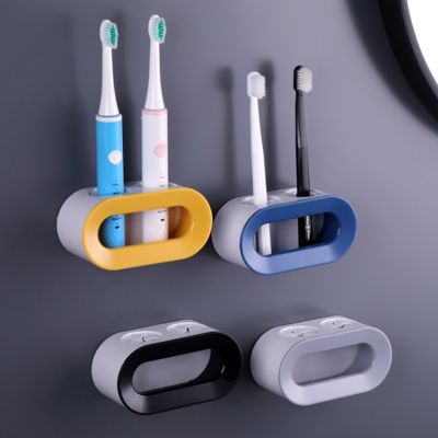 ที่ใส่แปรงสีฟันไฟฟ้าแบบติดผนังชั้นวางแปรงสีฟันแบบมีกาวในตัวอุปกรณ์ประหยัดพื้นที่ห้องน้ำ
