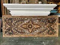 แผ่นไม้สักแกะสลัก ลายดอกไม้ สีน้ำตาลไหม้ ขนาด 90x30x1.5 cm. Carved teak board, floral pattern, burnt brown, size 90x30x1.5 cm.