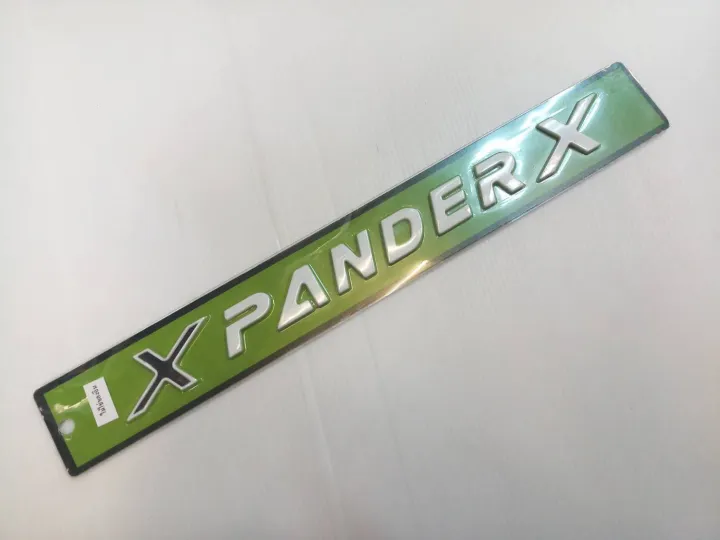 ad-โลโก้-xpanderx-สีขาว-ราคาต่อ1ชิ้น-ไม่ใช่งานจีน