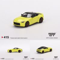 โมเดลรถ400Z ขนาดเล็กรุ่น GT 1:64 Fairlady Z 2023โมเดลรถยนต์ไดโอรามาอัลลอยสีเหลือง415