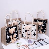 กระเป๋าถือ ลายการ์ตูน น้องหมี มาใหม่ สุดฮิตCartoon pattern handbag. Little bear. New arrival. Very popular.