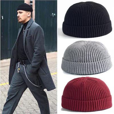 ผู้หญิงผู้ชาย Mini Fisherman Beanie หมวกฤดูหนาวที่อบอุ่นถัก Ribbed Skull Cap