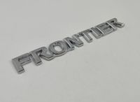 ฟรอนเทีย นิสสัน ติดด้านหลัง มีกาวให้พร้อมติดตั้ง Frontier Nissan Navara D40 Logo Emblems Rear