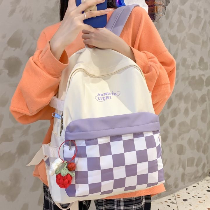 กระเป๋านักเรียนสาวน่ารักแฟชั่นความจุมากสำหรับผู้หญิงกระเป๋าบรรจุสีแบบชนสไตล์เกาหลีใหม่