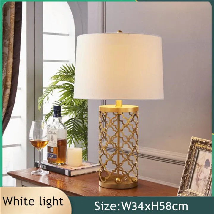 white and gold lamp table