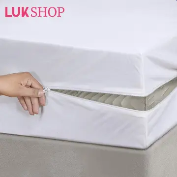 Plastic cot bed sales mattress protector