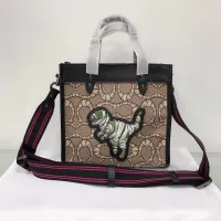 Shop Coach Dinosaur Bag online 