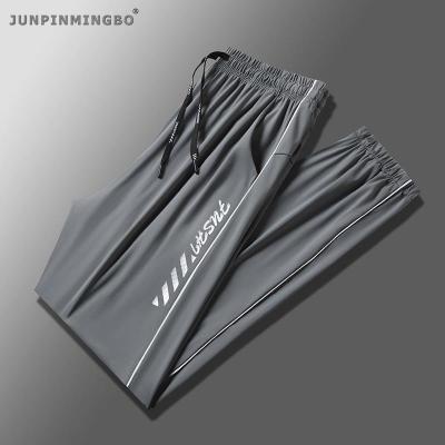 JUNPINMINGBO กางเกงลำลองไอซ์ซิลค์กันน้ำสำหรับผู้ชายกลางแจ้งเล่นกีฬาวิ่งแห้งเร็วระบายอากาศได้ดีพิมพ์ลายสไตล์คู่รัก