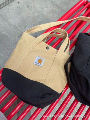 Carhartt Carhart Trade Tote Tide Tooling กระเป๋าทรงสี่เหลี่ยมมีหูหิ้วสะพายไหล่พกพาสะพายไหล่เดียวสำหรับผู้ชายและผู้หญิง