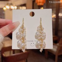 ? เครื่องประดับ South Koreas new exaggerated long tassels pearl earring S925 silver needle light luxury niche web celebrity with stud earrings earrings