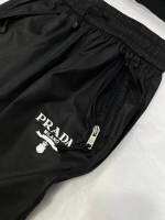 Prada ฤดูใบไม้ผลิฤดูร้อน2023ใหม่ไนลอนพิมพ์ตัวอักษรตกแต่งเอว Drawstring กางเกงทรงหลวมยืดหยุ่น