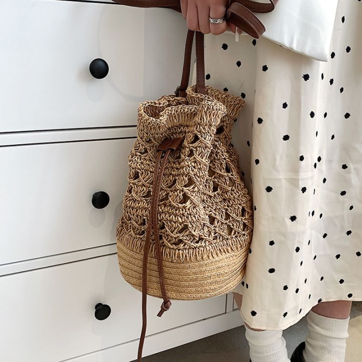 new-hollow-out-straw-bucket-bag-spring-2022-large-capacity-woven-bag-with-drawstring-seaside-on-his-single-shoulder-bag