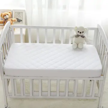 Cot bed protective hot sale sheet