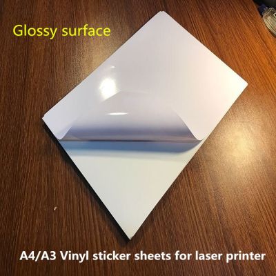 Self Adhesive a4 size Bright glossy Vinyl Sticker in sheets for Laser printer