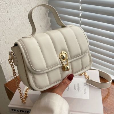 Senior feeling small shoulder bag female 2022 new tide joker oblique satchel retro embroider line portable small bread